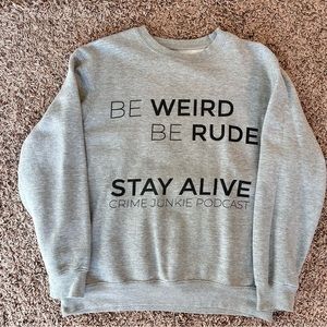 Be Weird, Be Rude, Stay Alive! Crime Junkie Life Moto! Gray crew neck medium.